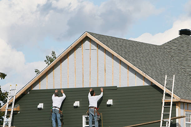 Professional Emergency Siding Repair technician working in Carrollton, IL